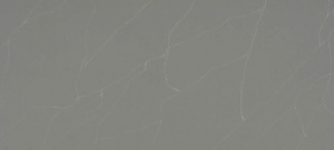A countertop sample labeled Pietra Grey, available in Bangalore, showcasing a rich dark gray tone with delicate white veins for luxurious interiors.